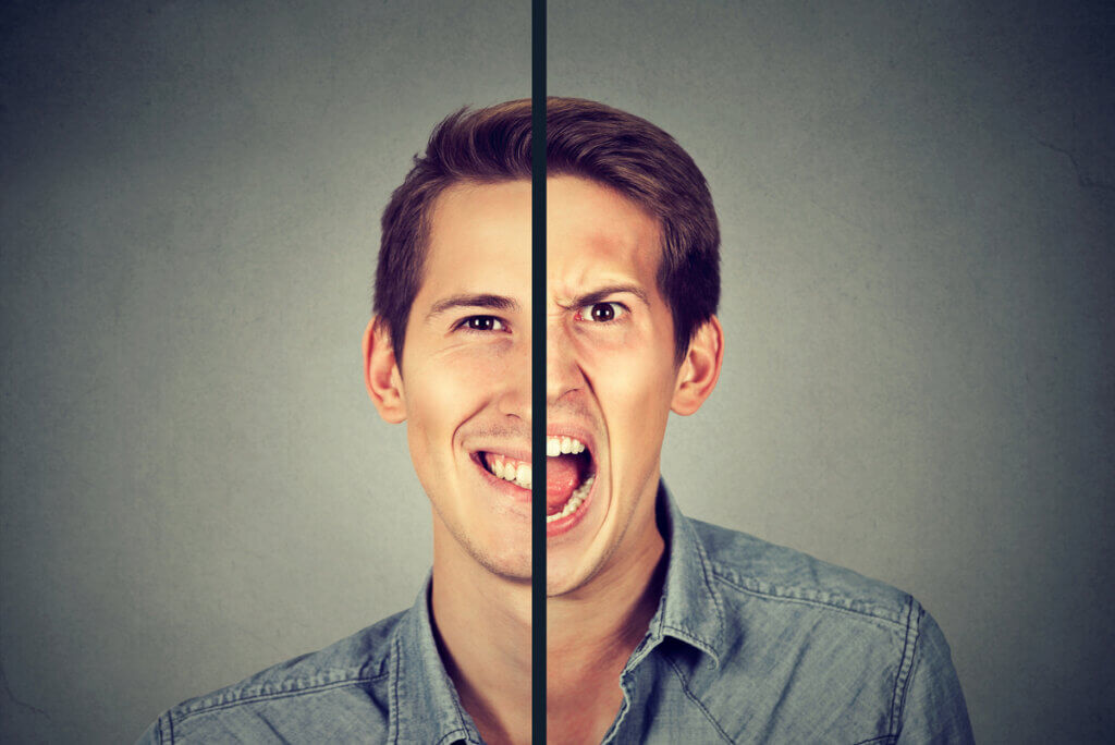 The image of a person with bipolar showing happiness on one side of his face and anger on the other.