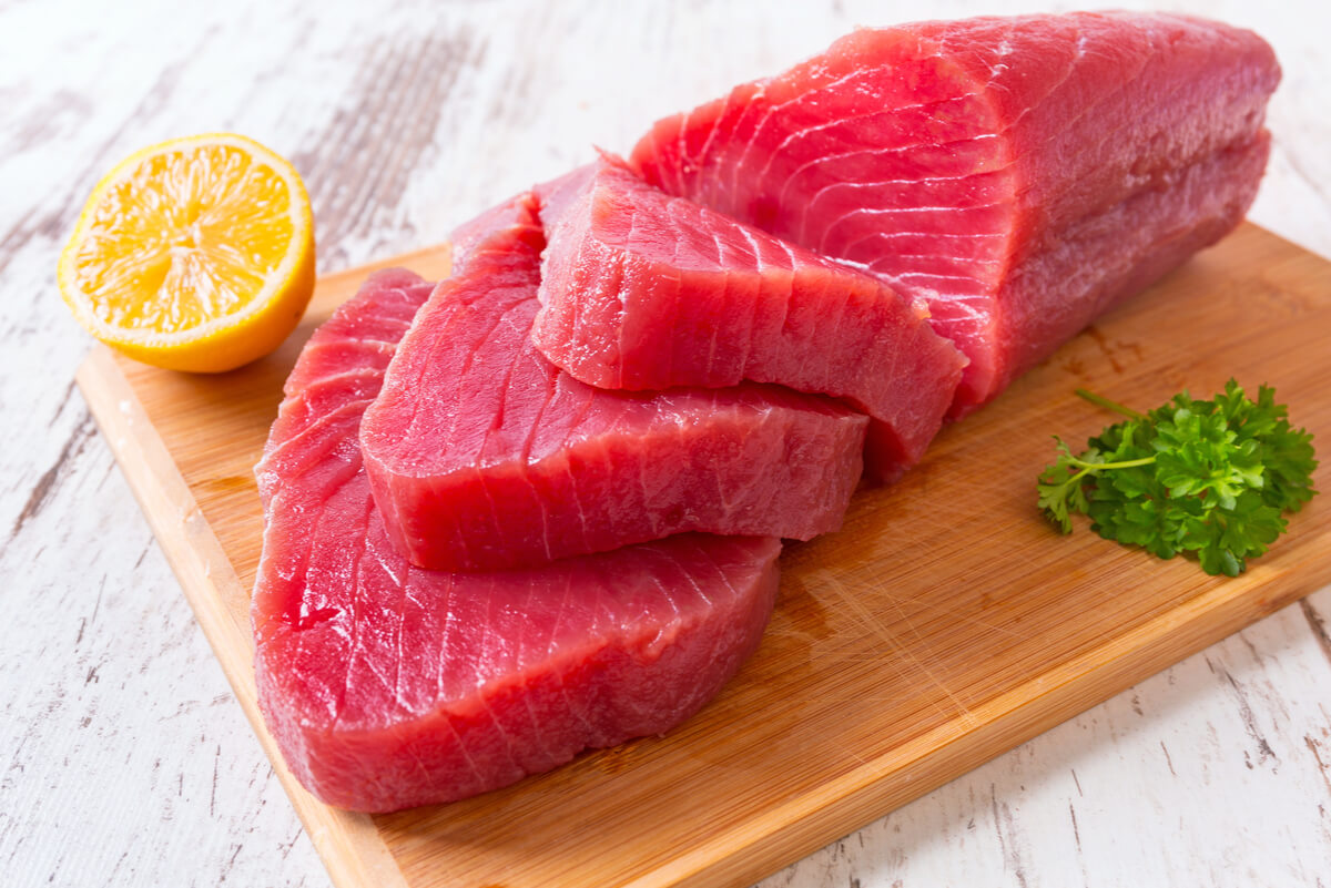 Fresh tuna on a cutting board.