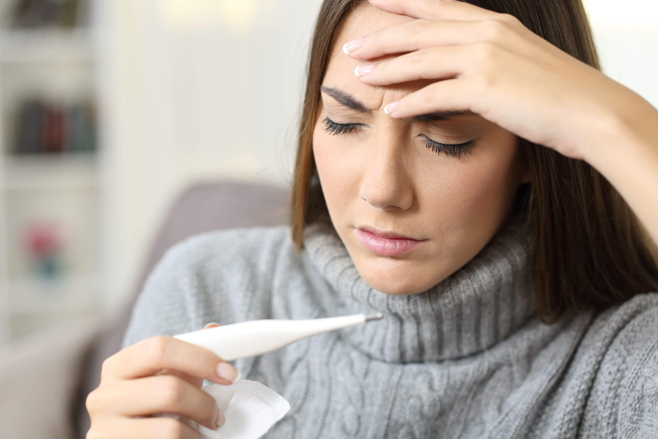 Fever can occur along with back pain.