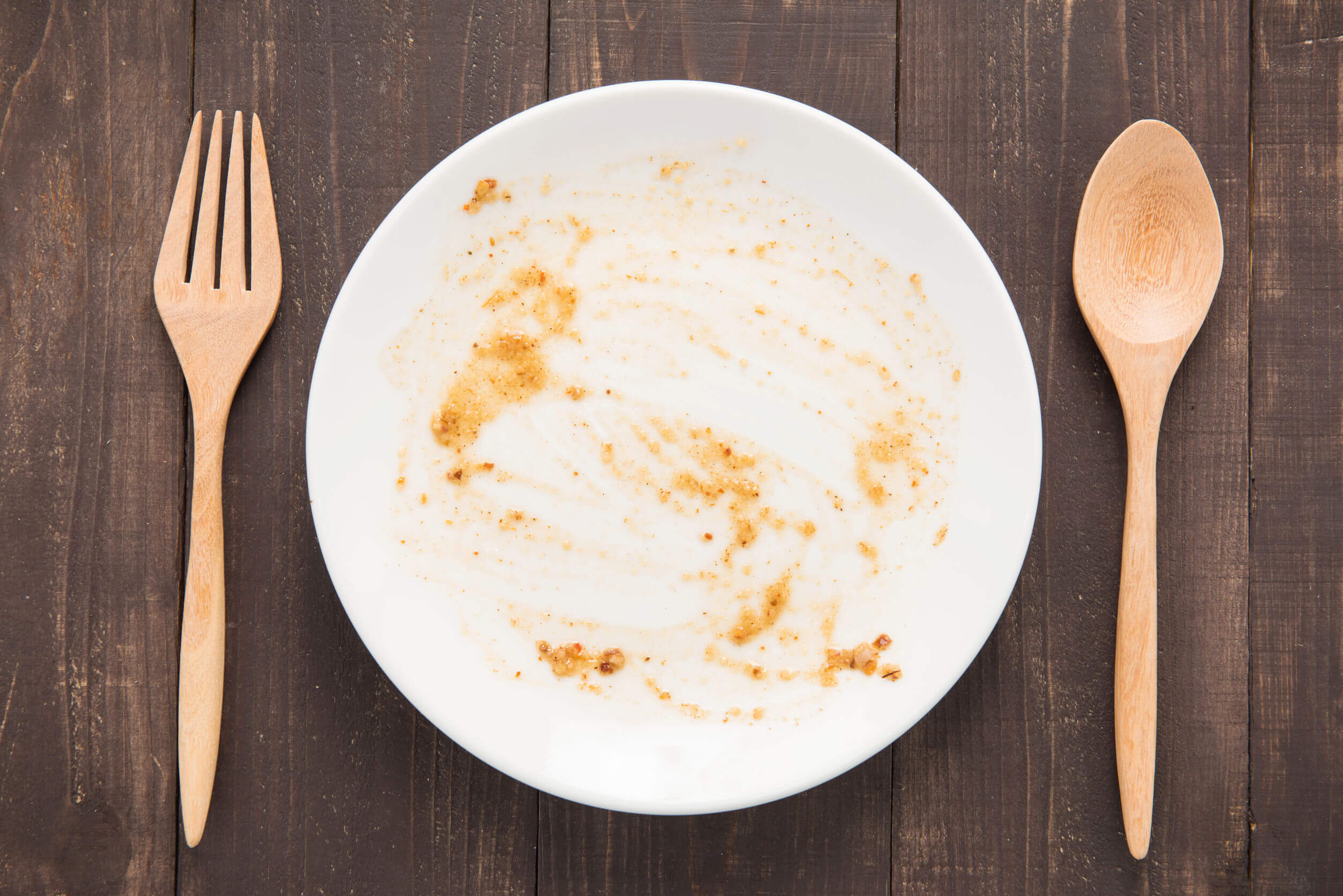A plate that's been emptied of food.