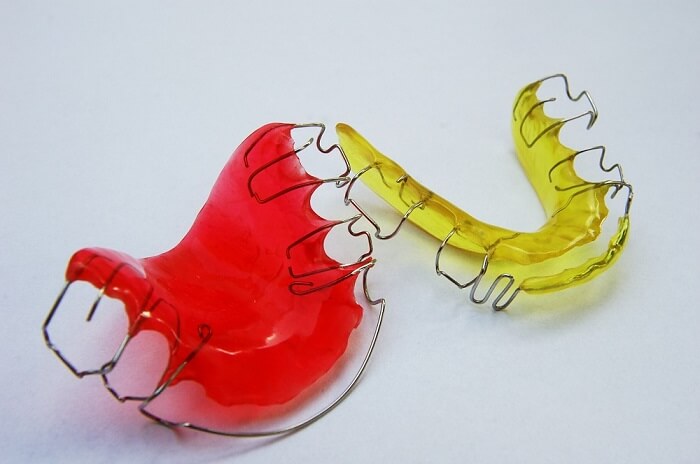 Red and yellow retainers.